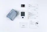 Trọn bộ unboxing máy đo huyết áp Omron HEM-7183 gồm thân máy, vòng bít, 4 pin AA và sách hướng dẫn